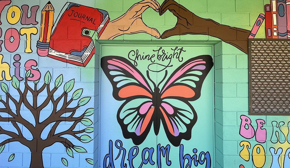 News-school mural Students looking through microscopes Banner